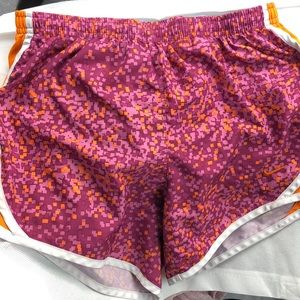 Orange & purple patterned Nike shorts. Size XL
